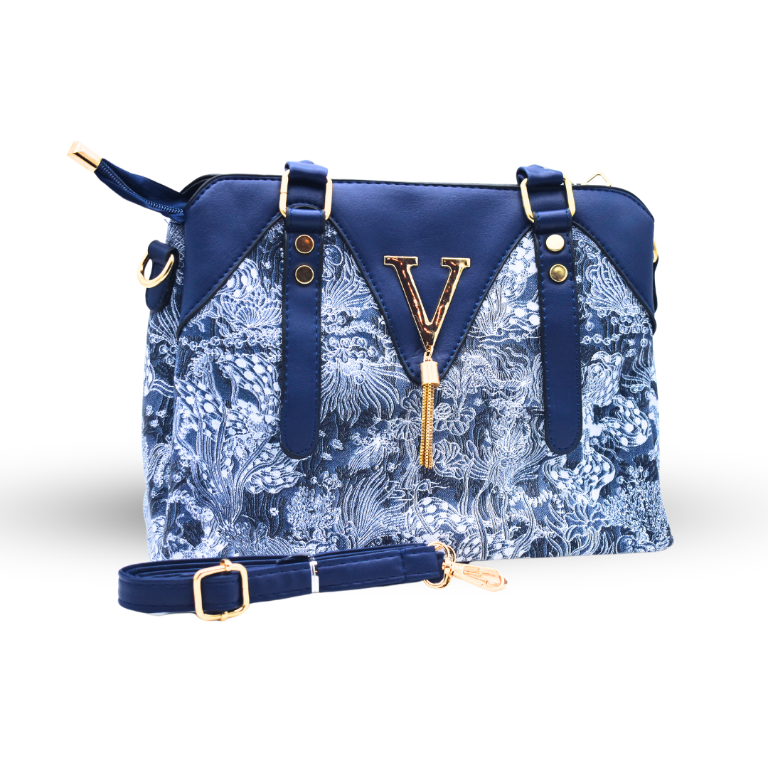 Timeless Leather Handbag with Elegant Fabric-Inspired Embroidery