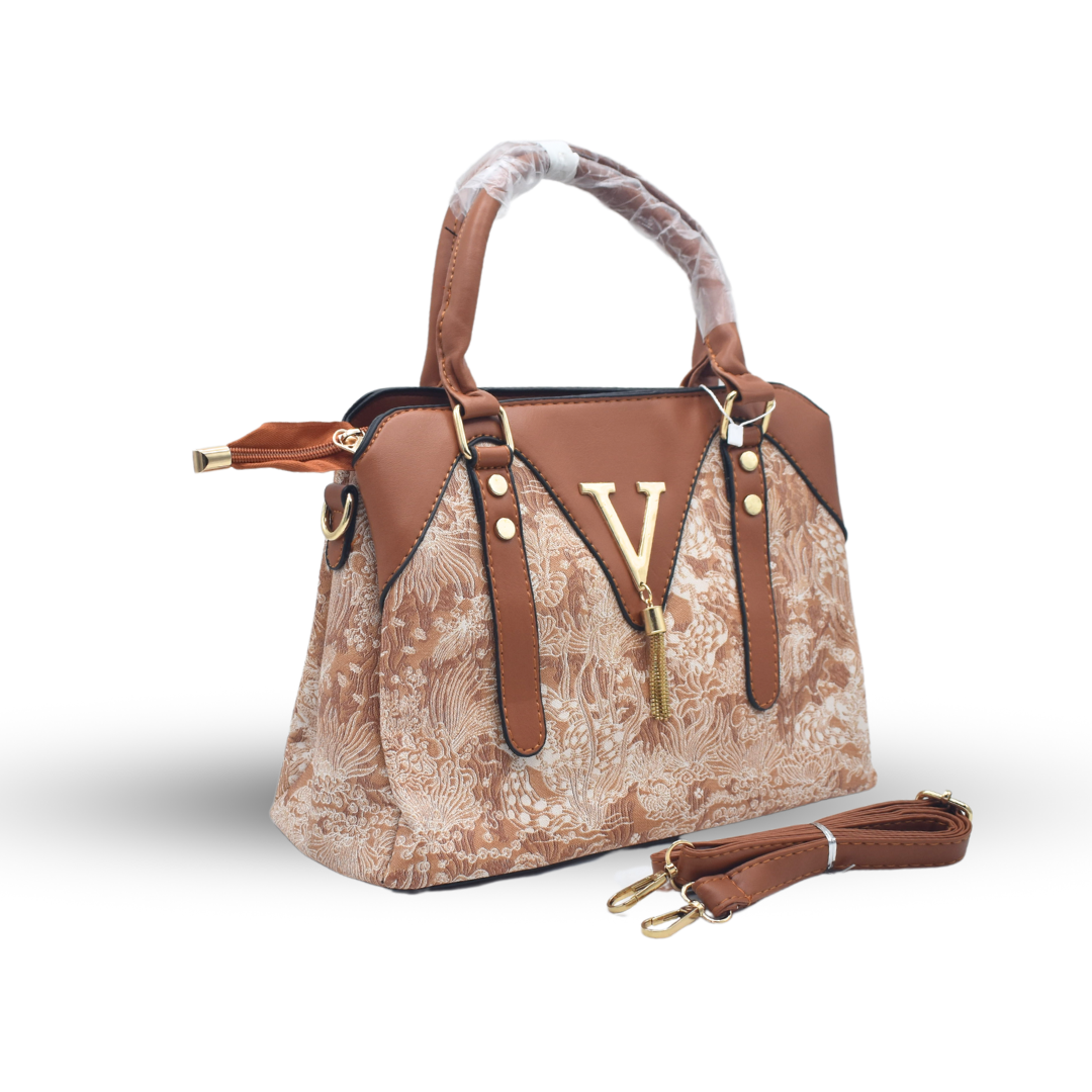 Timeless Leather Handbag with Elegant Fabric-Inspired Embroidery