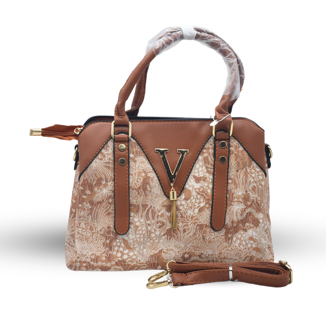 Timeless Leather Handbag with Elegant Fabric-Inspired Embroidery