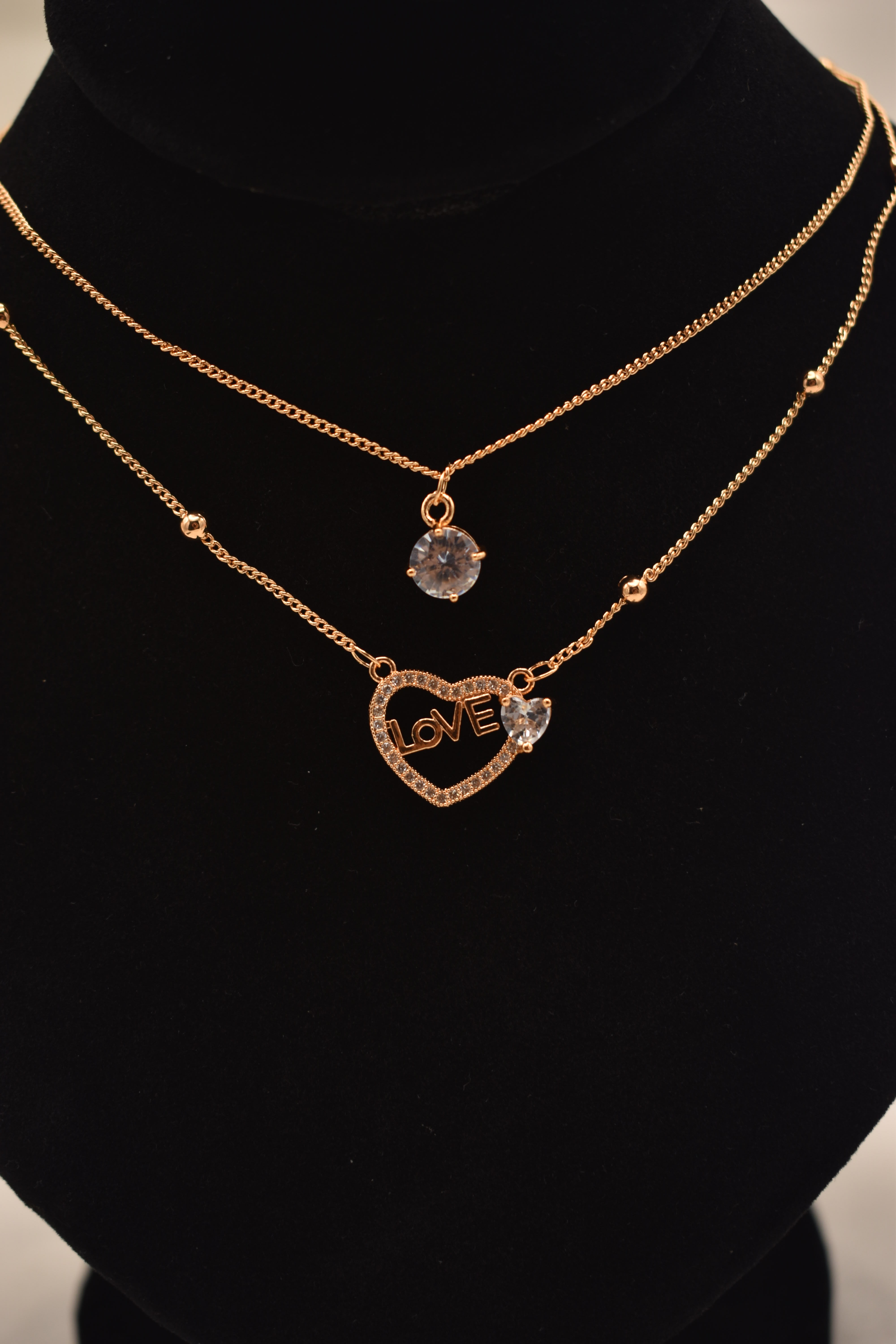 Gold Layered Necklace with Heart and Gemstone Pendants