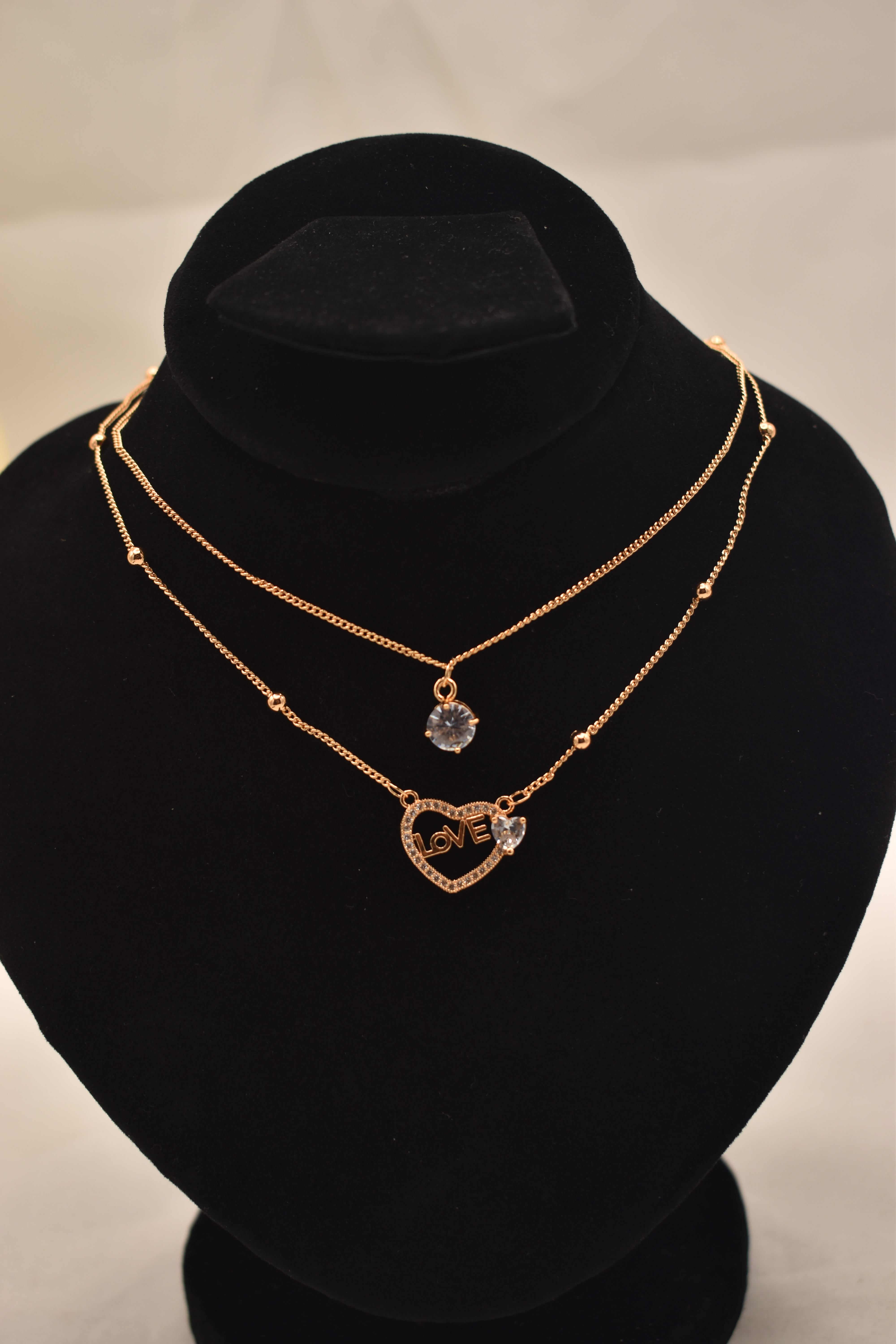 Gold Layered Necklace with Heart and Gemstone Pendants