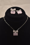 Elegant Silver Jewelry Set with Bow and Gemstone Accents